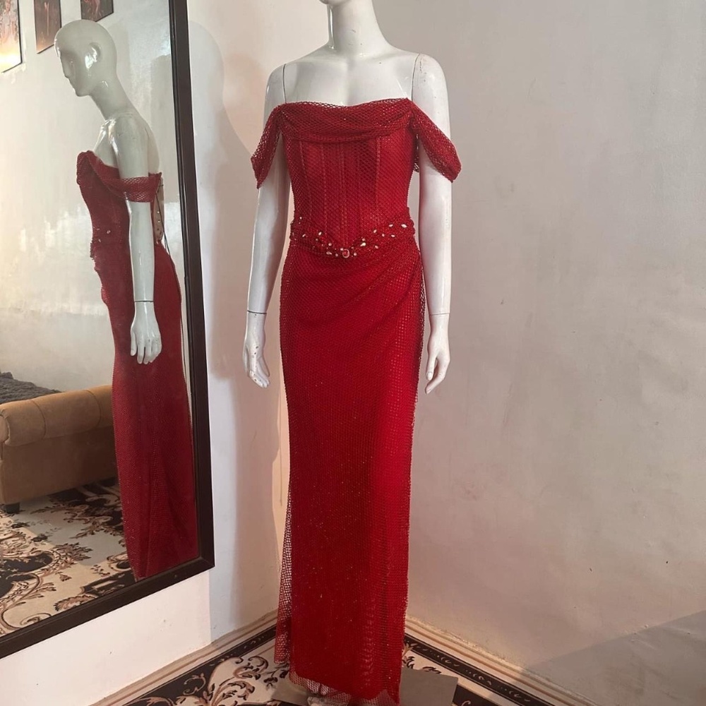 Red bedazzled corset prom dress.